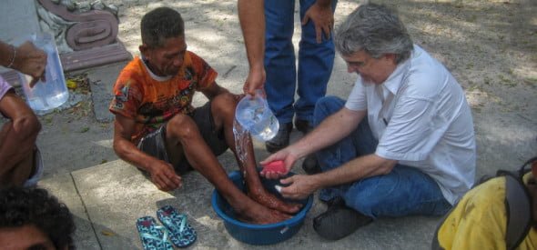 Getting ready to wash Saulo's feet