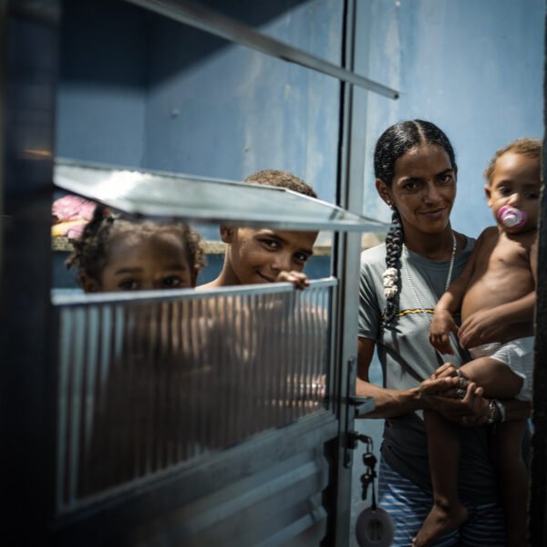 Raiane and the new aluminum door